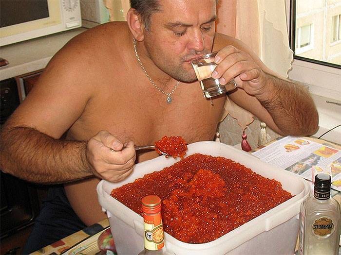 Create meme: red sockeye salmon caviar, a man with caviar and vodka, 1 kg of red caviar