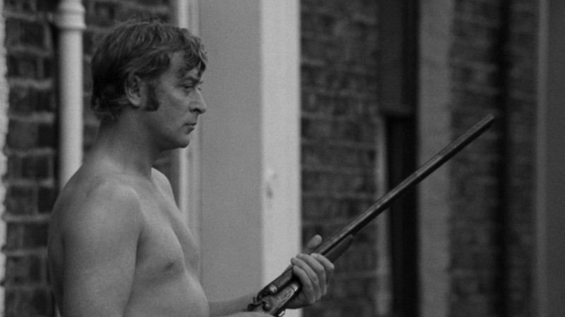 Create meme: the white knight, knight , Michael Caine with a gun