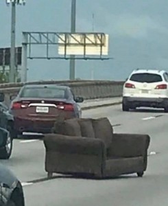 Создать мем: на дороге, a car, диван едет по дороге