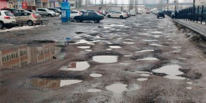 Create meme: potholes, Russian roads, broken roads of Russia
