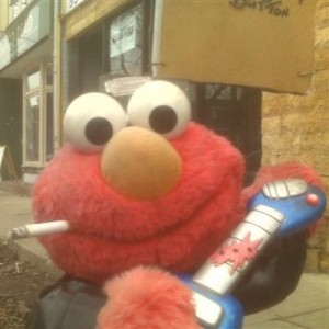 Create meme: toy, Elmo, funny elmo pictures