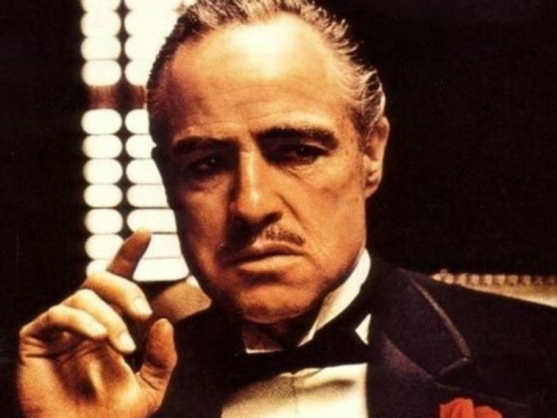 Create meme: don Corleone Smoking a cigar, marlon brando don corleone, don Corleone 
