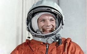 Создать мем: первый космонавт, гагарин в скафандре, космос гагарин