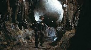 Create meme: Indiana Jones stone ball, Indiana Jones with a flashlight, indiana jones cave