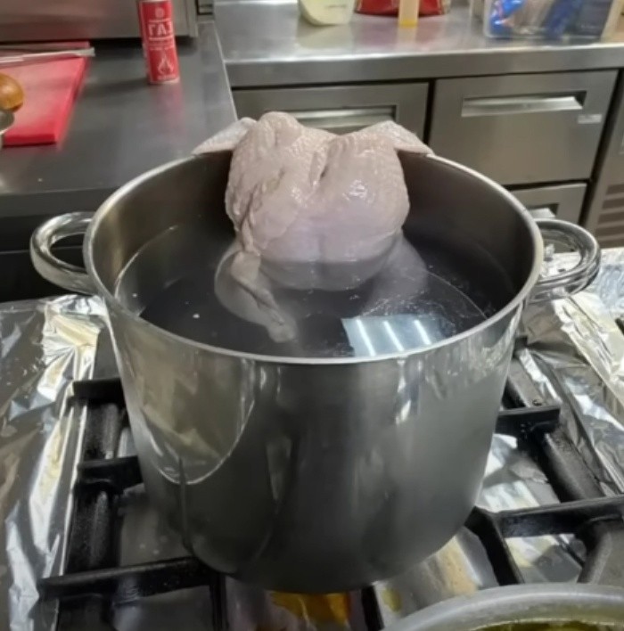 Create meme: chicken in a saucepan, cooking meat, how long to cook a chicken breast