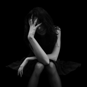 Create meme: guilt, loneliness, sad woman on a dark background