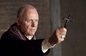 Create meme: the man with the cross of exorcism, Anthony Hopkins with a cross, the exorcist priest