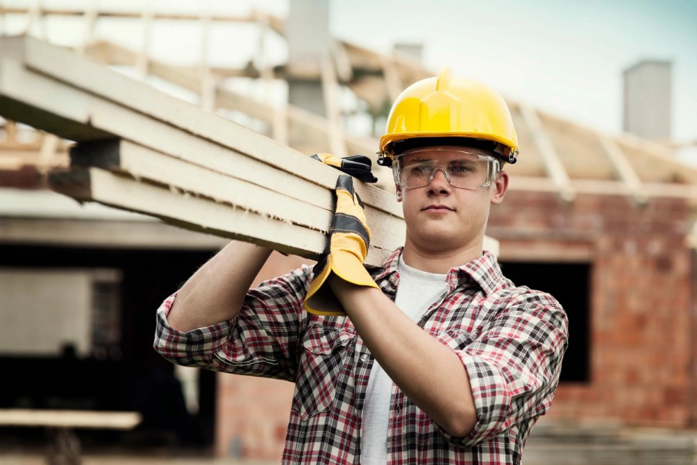 Create meme: construction specialties, a worker in a hard hat, builders in helmets