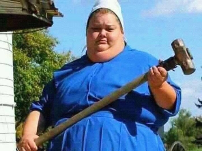 Create meme: angry Gran , a fat woman with a sledgehammer., the woman is fat