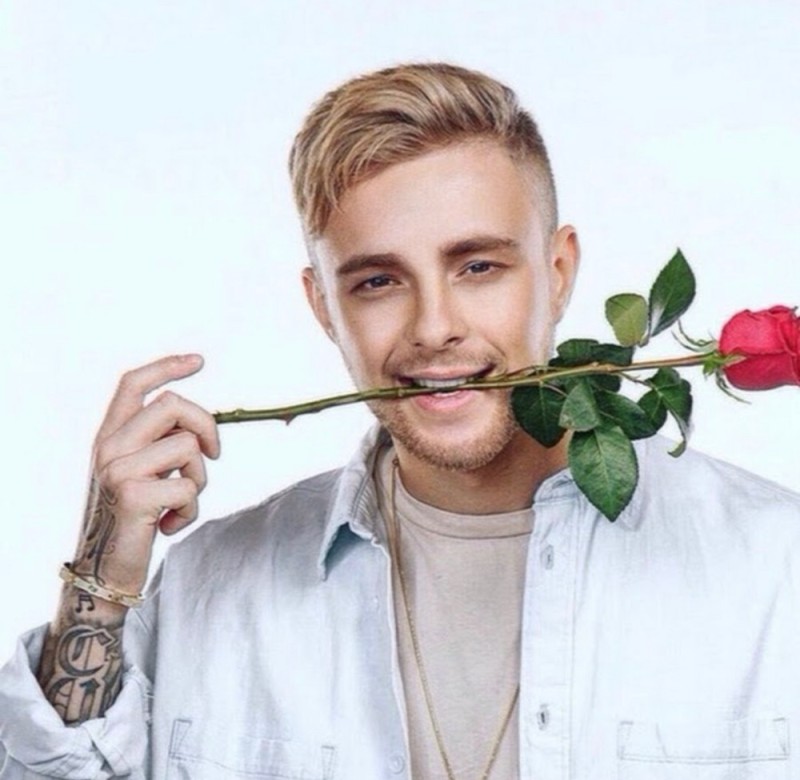 Create meme: Egor Krid bachelor, egor creed with flowers, Egor Creed with a rose in his teeth