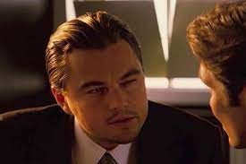 Create meme: DiCaprio squints meme, dicaprio meme, DiCaprio beginning