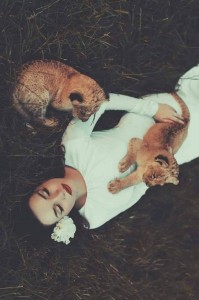 Create meme: girl, Cat, photo shoot with a lion cub