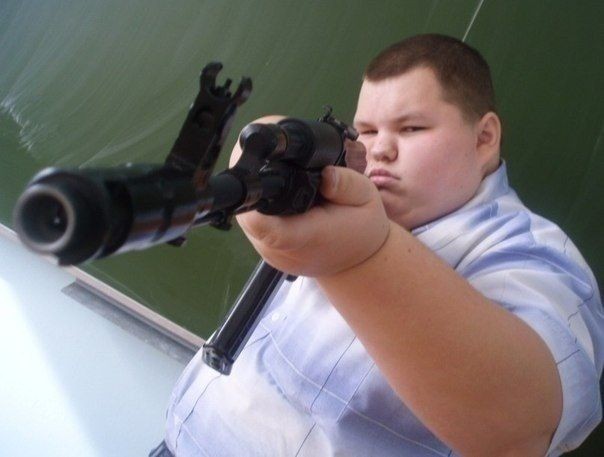 Create meme: a schoolboy with a gun, schoolchildren with guns, A fat schoolboy with a gun