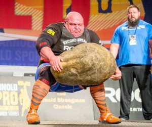 Create meme: a giant potato, Bulgarian strongman raises huge potatoes, huge potato