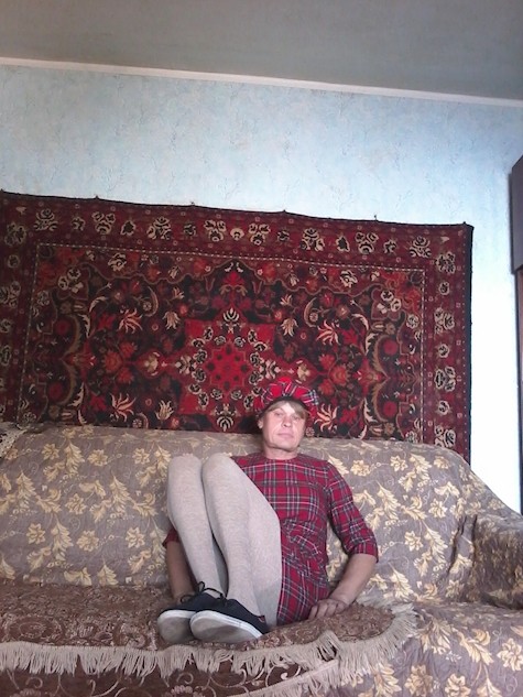 Create meme: Russian guys, people , a man on a carpet background