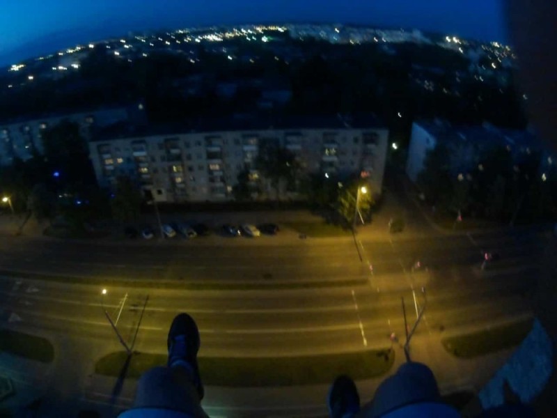 Create meme: on the edge of the roof at night, roof at night, view from the roof at night