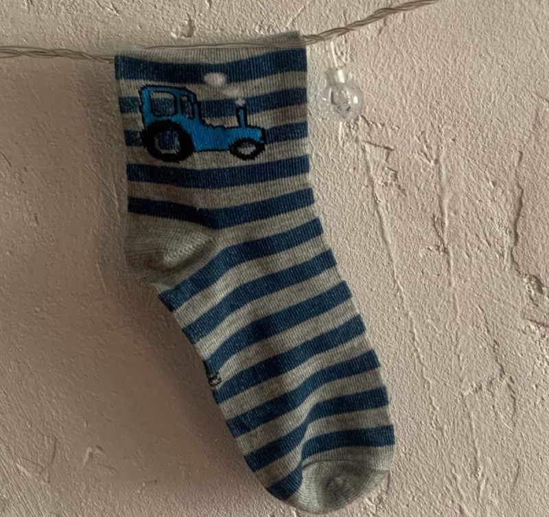 Create meme: on socks, baby socks, pair of socks