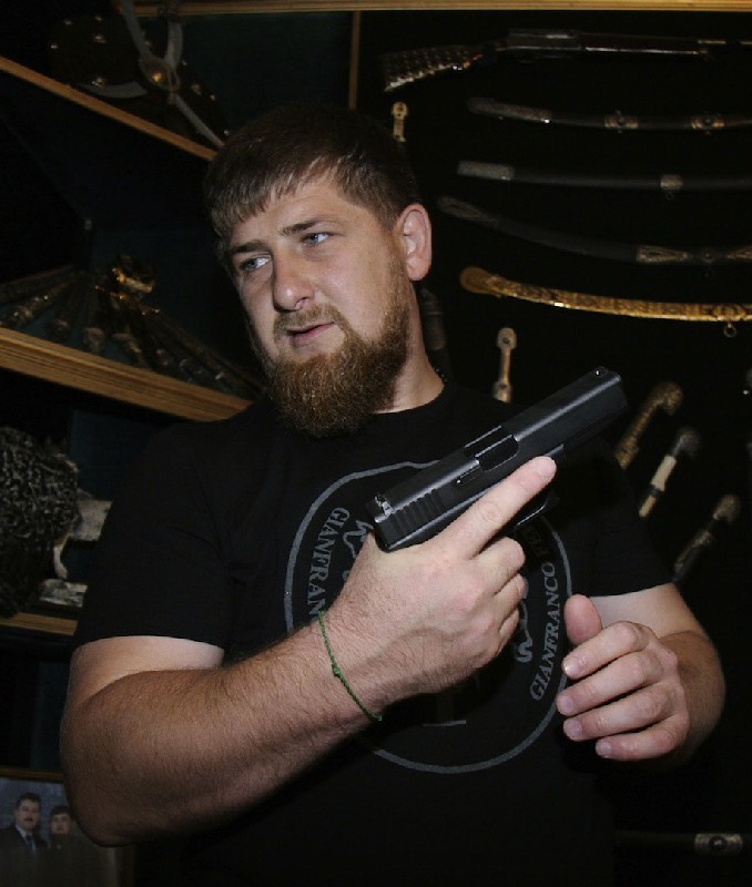 Create meme: Ramzan Kadyrov , Ramzan Kadyrov's golden stechkin, ramzan kadyrov in his youth