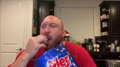 Create meme: Bald man eats chips, The bald man eats chips, Bald dude