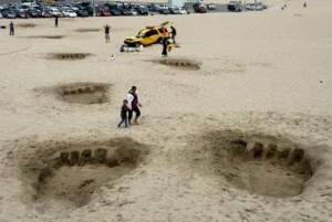 Create meme: sand beach, beach, footprints in the sand