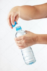 Create meme: mineral water bottle in hand, holding a water bottle, water bottle in hand