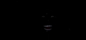 Create meme: Negro laughing in the dark, black, dark, Negro in the dark