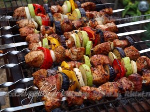 Create meme: juicy kebab, the skewers on the grill, photo of the skewers on the grill