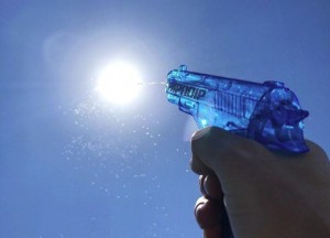 Create meme: gun, Small object, water gun in the sun