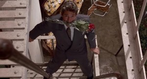 Create meme: male, the beauty of the end of the movie, a man climbs in the window with flowers