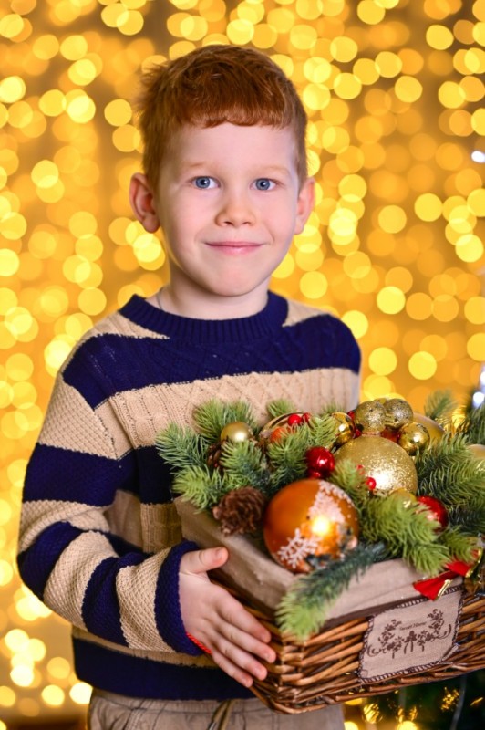 Create meme: people , Christmas, A boy opens a New Year's gift