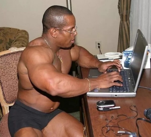 Create meme: Jock meme, male Jock, a wrestler with a laptop