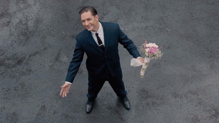 Create meme: Tom Hardy with flowers meme, Tom Hardy with a bouquet of memes, tom hardy with flowers