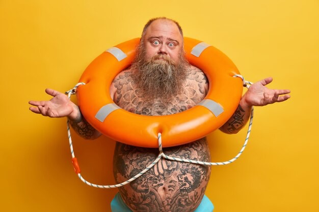 Create meme: A fat man in a lifebuoy, fat man, a bearded man