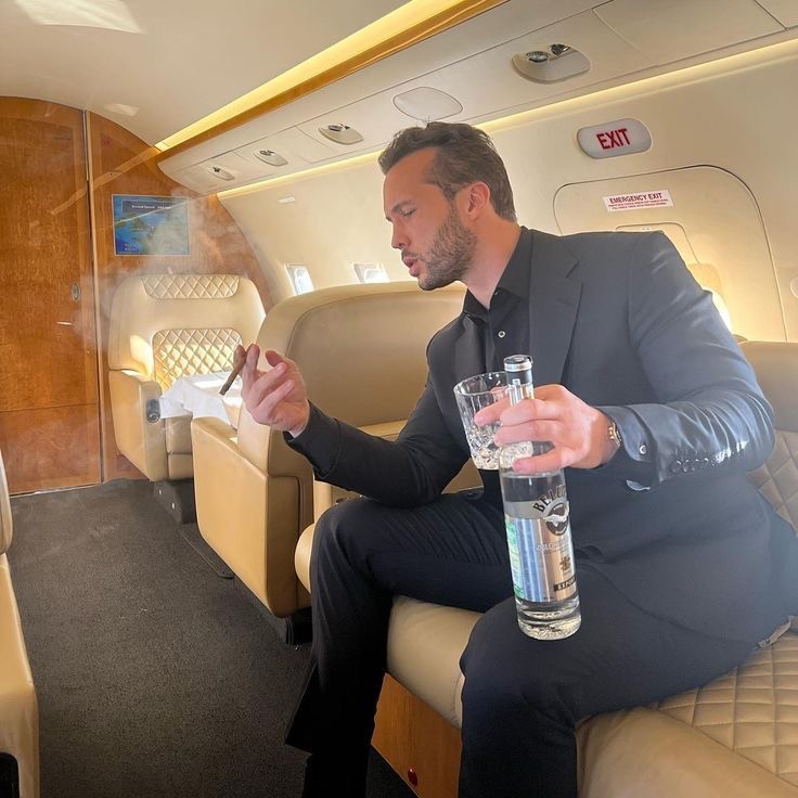 Create meme: male , andrew tate near his private jet, people 