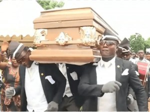 Create meme: funeral in Africa, niggers funeral, Negros dancing with the coffin