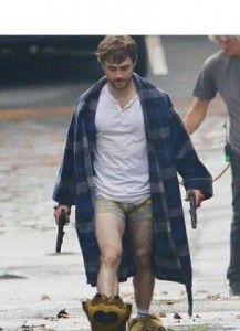 Create meme: Harry Potter sneakers, Daniel Radcliffe guns akimbo, Radcliffe with guns