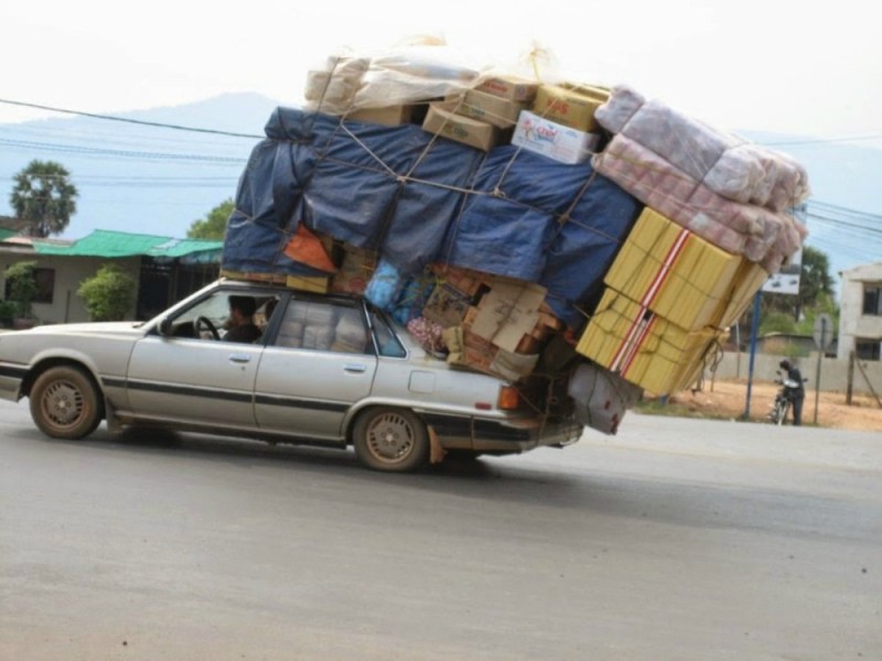 Create meme: overloaded car, an overloaded car, loaded car