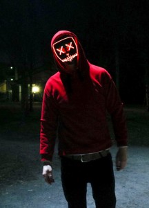 Создать мем: человек, неоновая маска, маска судная ночь красная