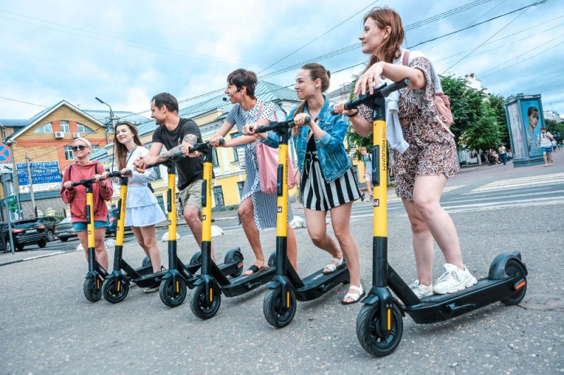 Create meme: electric scooters on the street, electric scooter rental, an electric skateboard