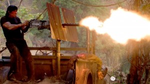 Create meme: Rambo iv, shooting machine gun, Rambo shoots huskies