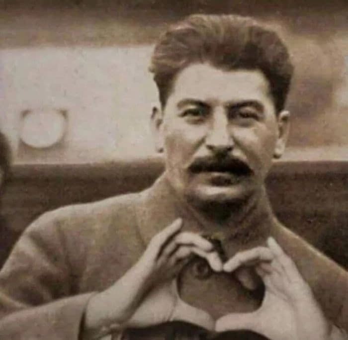 Create meme: Stalin shows heart, Stalin Joseph Vissarionovich heart, Stalin with a heart from his hands