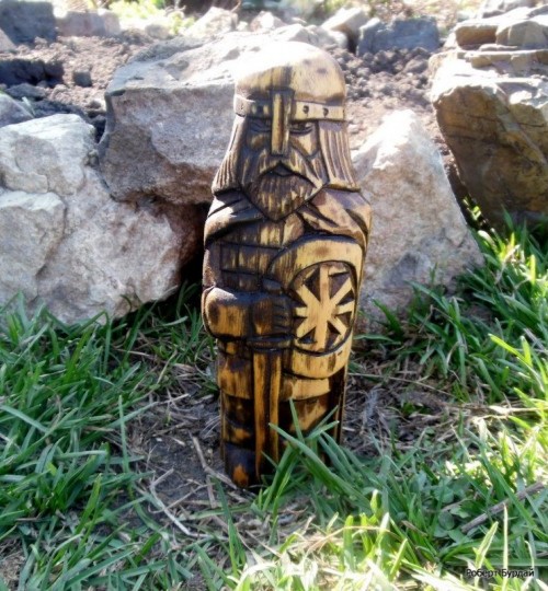Create meme: Perun the god of the Slavs is a statue, svaroga made of wood, idol of perun