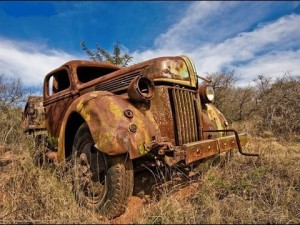 Create meme: a rusty car, old car, Ford abandoned car