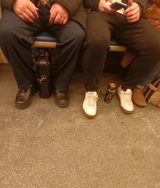 Create meme: legs in the subway, funny people in the subway, a man in the subway