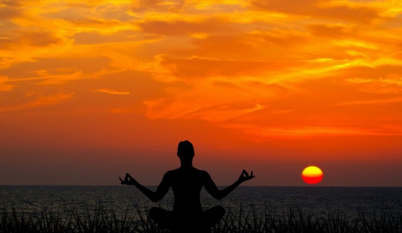 Create meme: yoga at sunset, Sunset meditation, meditating at sunset