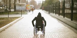 Create meme: wheelchair photo, street installers, man in wheelchair