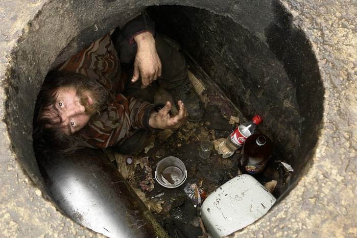 Create meme: A homeless man in the sewer, homeless , The homeless man in the well