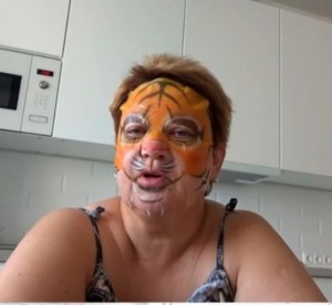 Create meme: mom honors, the mother of the student in the mask of a tiger meme, mother honors life