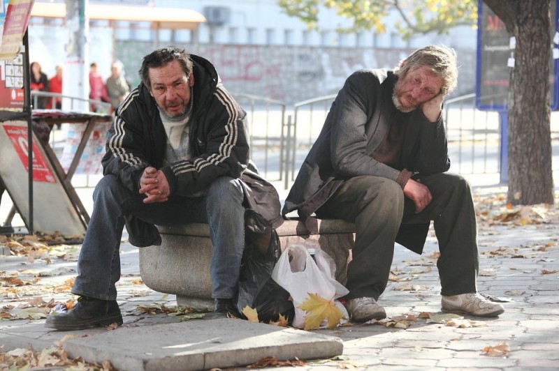 Create meme: homeless , homeless Russia, a bum sits