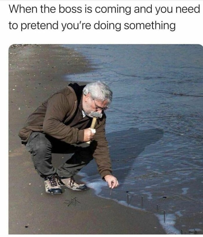 Create meme: feet , meme sand, A man hammers nails into the sea